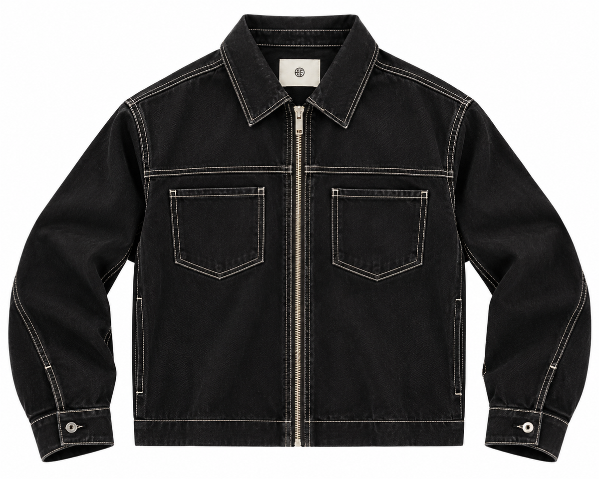 Black zip-up denim jacket with contrast white stitching, two chest pockets, and button cuffs
