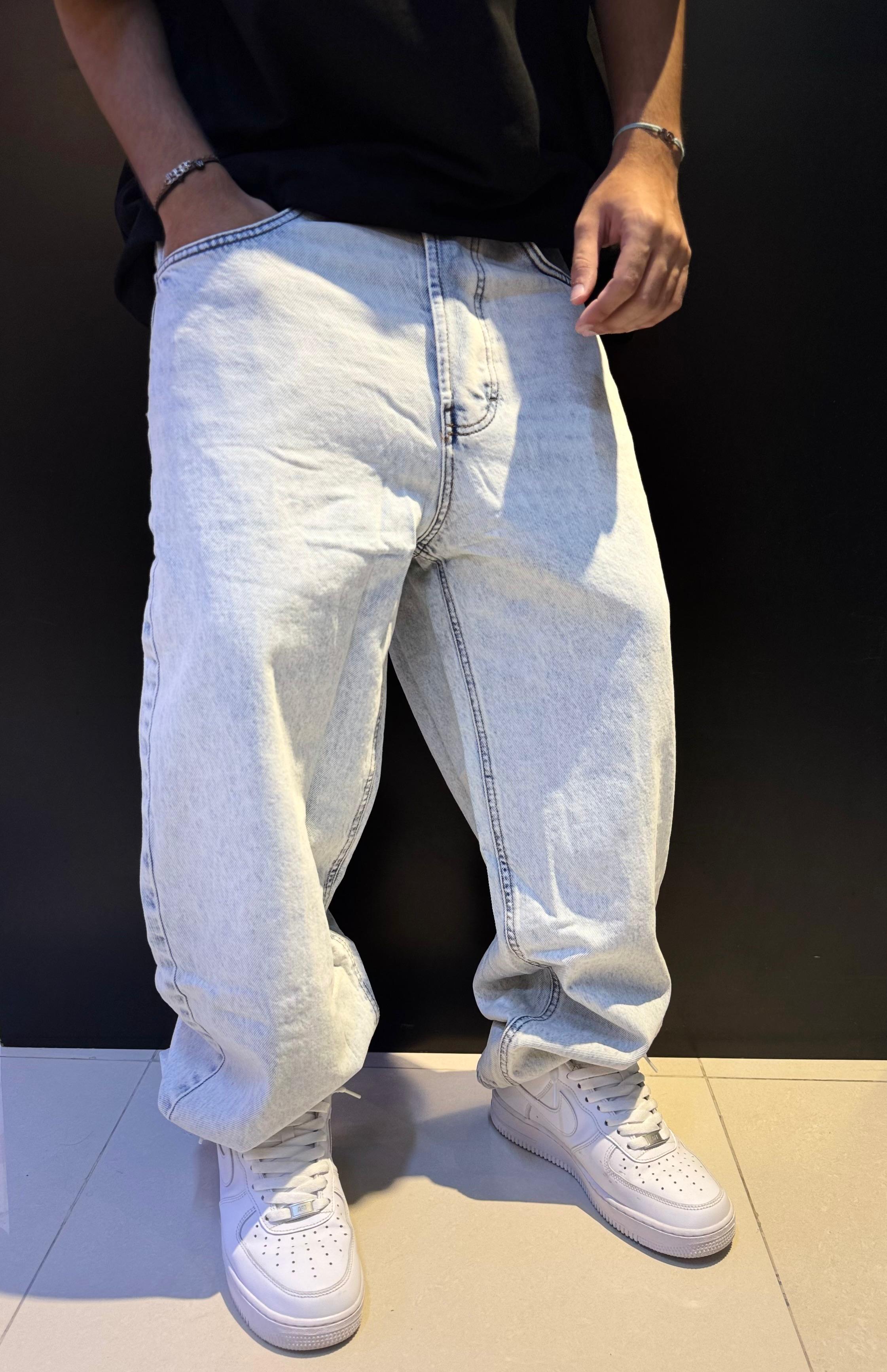 Light Blue Acid-Washed Jeans with White Sneakers