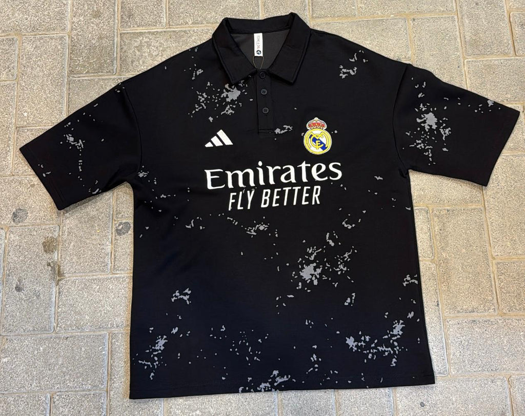 Real Madrid Black Polo Shirt - Emirates Sponsor Logo & Grey Splatter Pattern