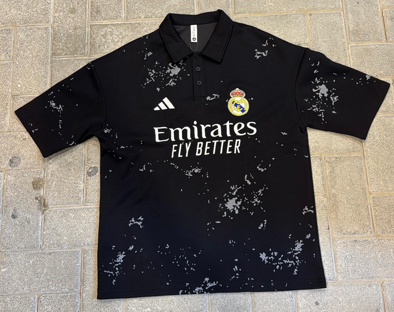 Real Madrid Black Polo Shirt - Emirates Sponsor Logo & Grey Splatter Pattern