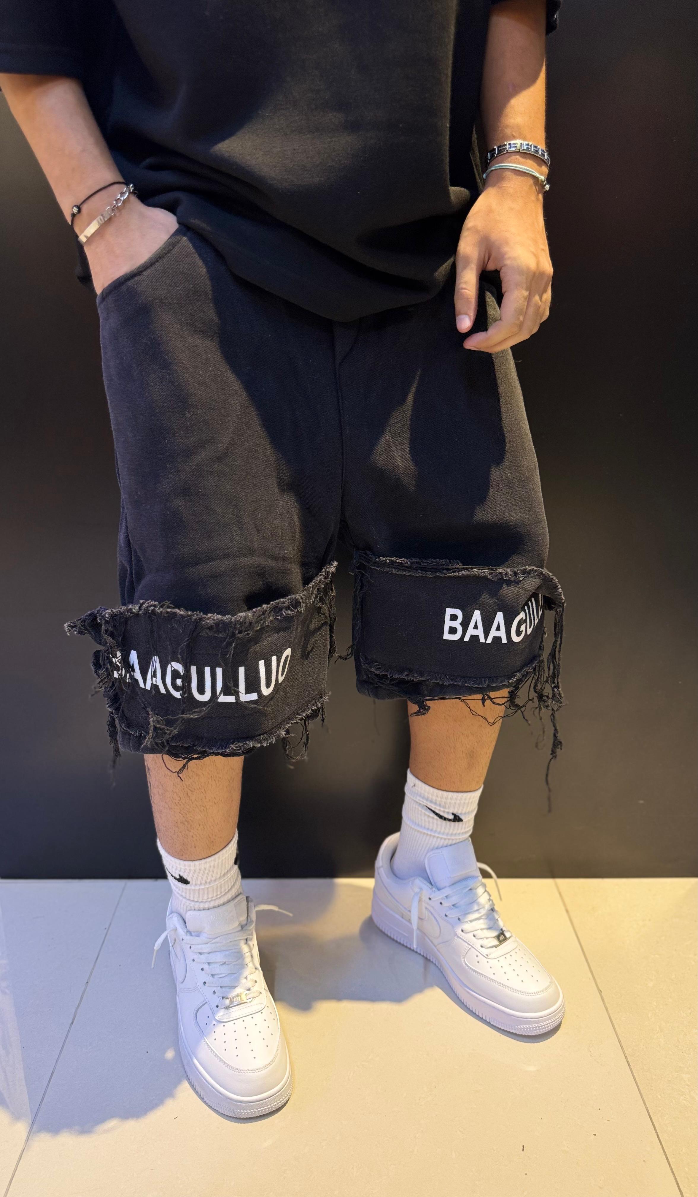 Black Distressed Shorts with White Text and Frayed Hems