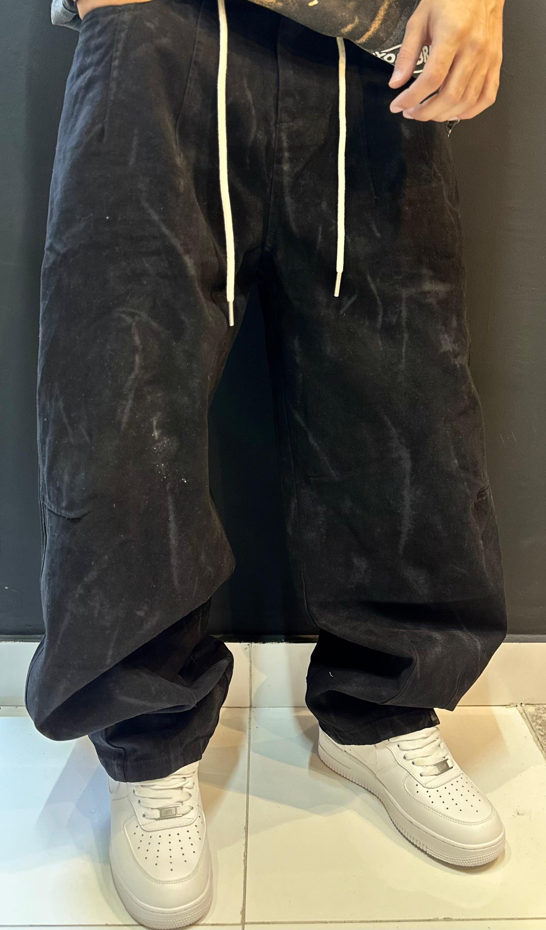 Black Baggy Trousers and Crisp White Sneakers
